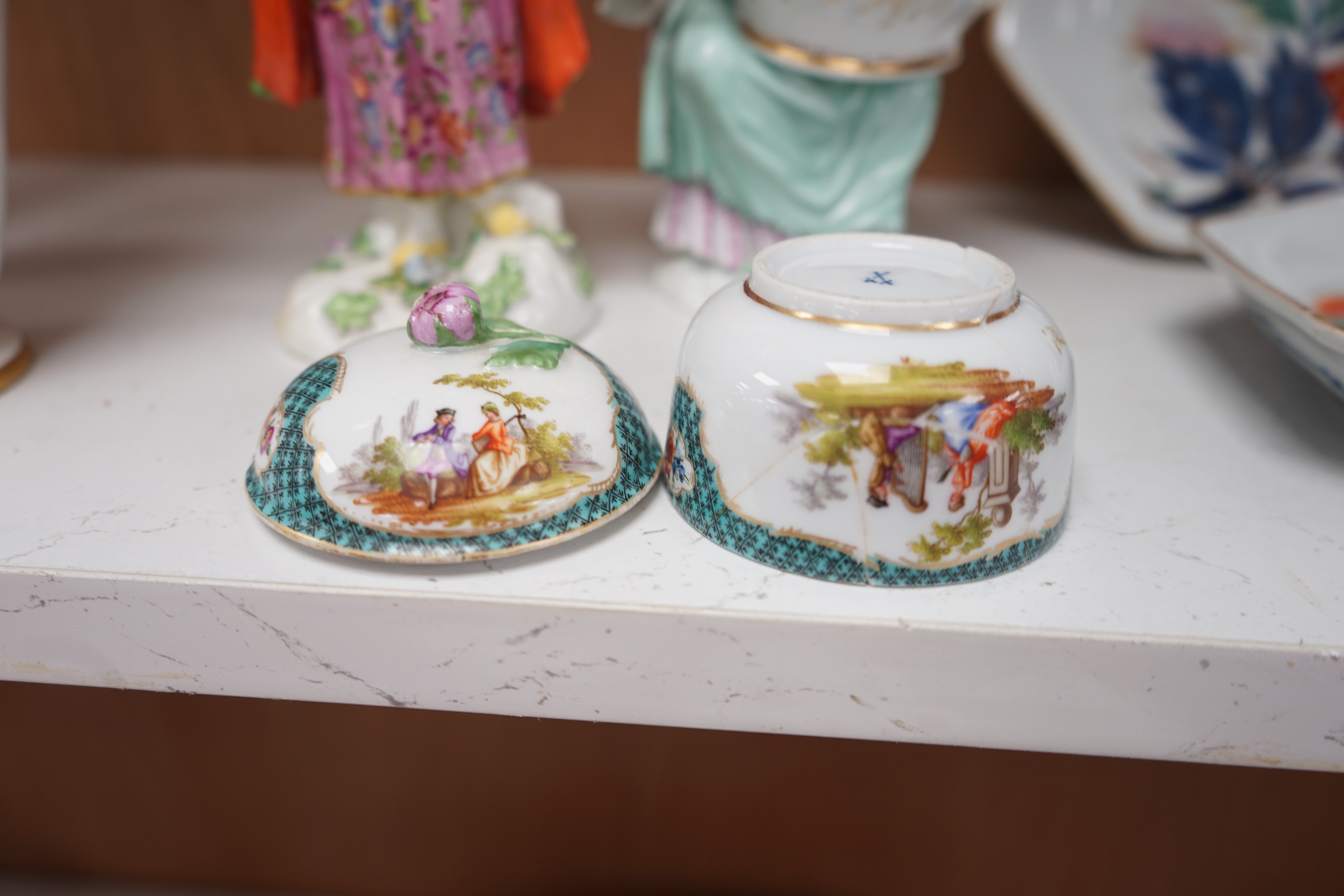 A group of various ceramics to include a Berlin floral decorated vase, a pair of Meissen dishes, similar box and cover, figural sweetmeat and figure of a Turk, together with a pair of Japanese Imari dishes, tallest 33cm.